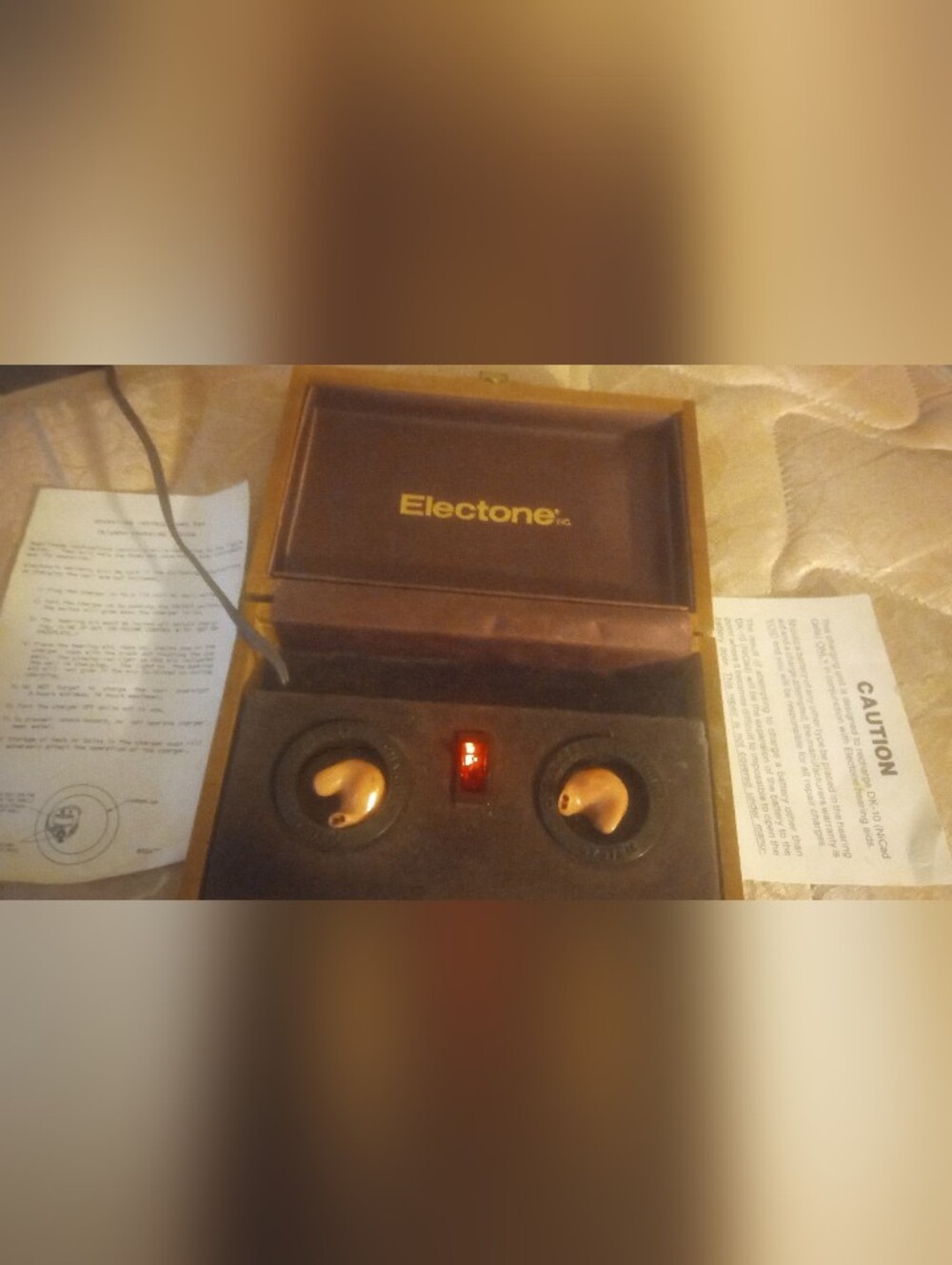 vintage Electone In-the-Ear (ITE) hearing aid charging system.